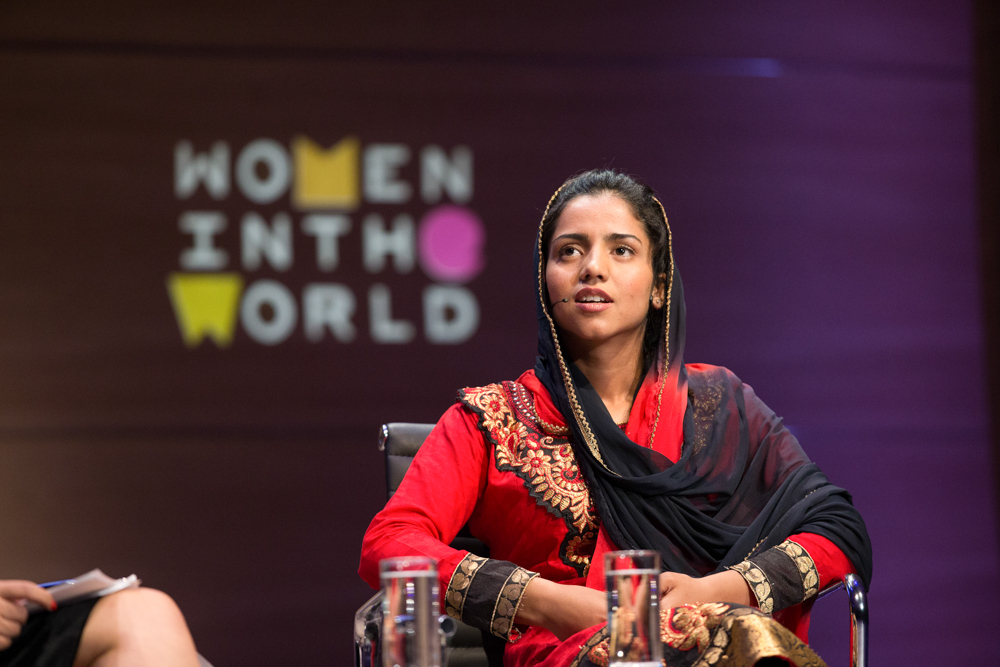 Zarghuna Kargar, Author and Journalist, BBC interviews Sonita Alizadeh, Rapper and Activist on Daughters For Sale at Women In The World London Summit, Cadogan Hall, London. 10/09/2015